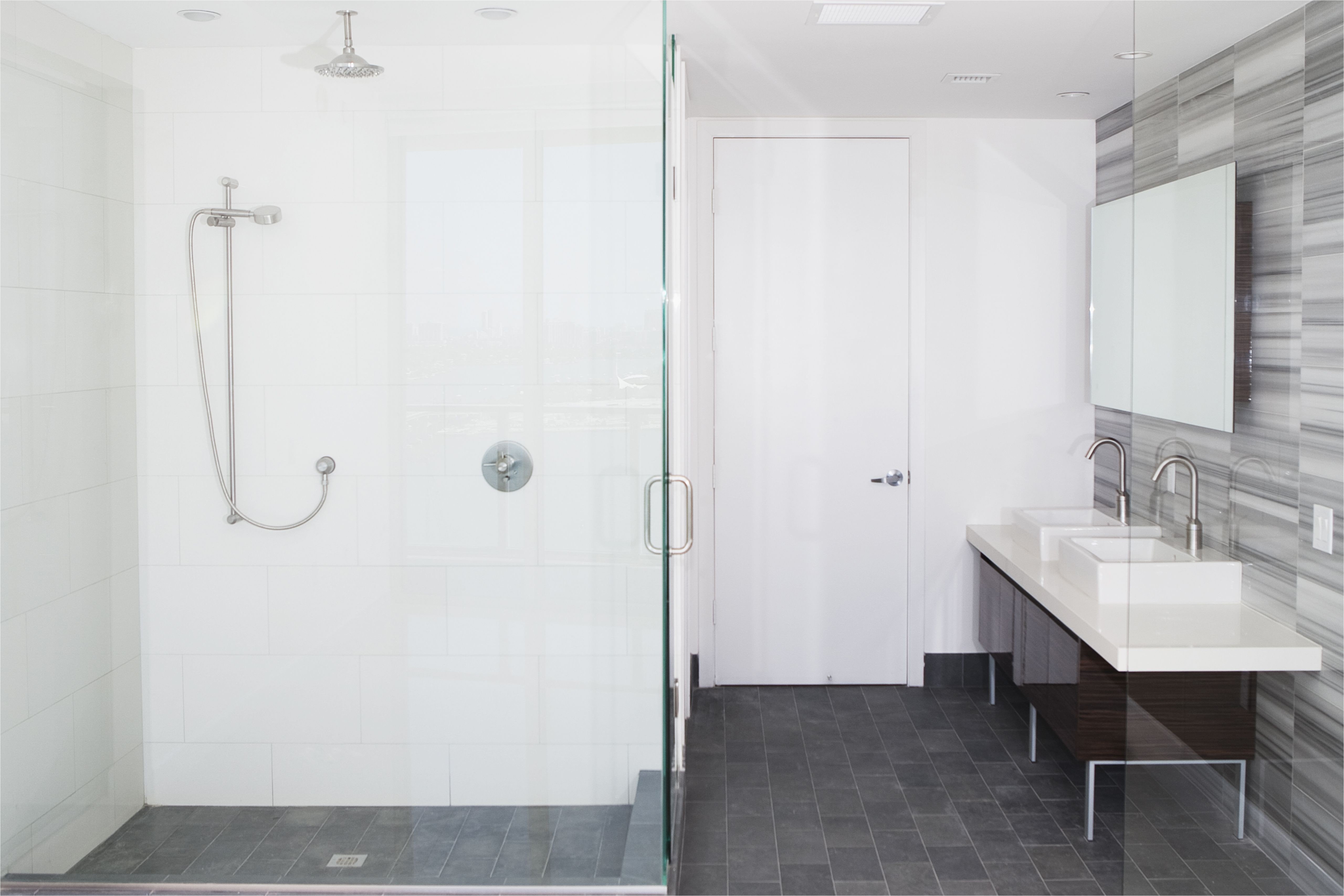 shower sinks and mirror in modern bathroom 533766223 588d18b45f9b5874ee14cb5c jpg