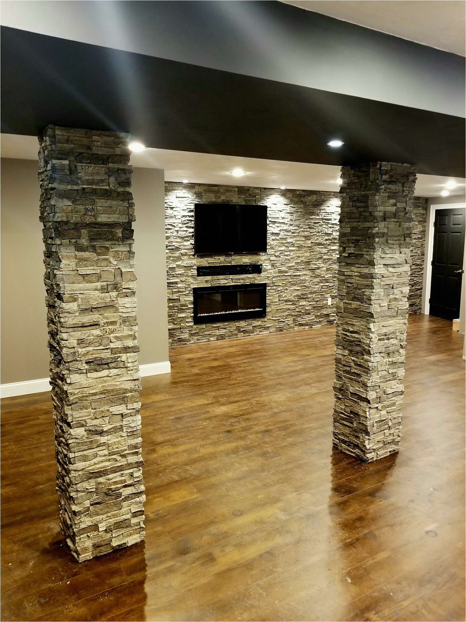 basement accent wall w matching columns