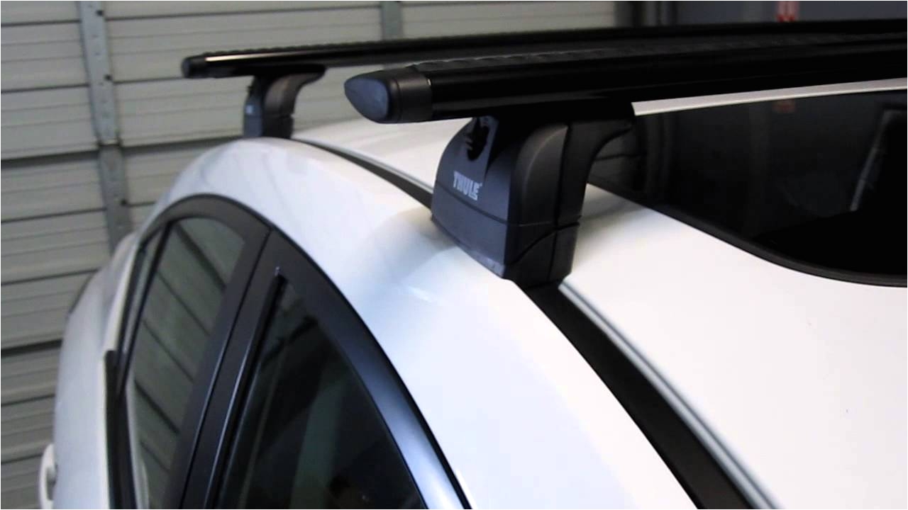 mazda 3 sedan with thule 460r podium black aeroblade roof rack by rack outfitters