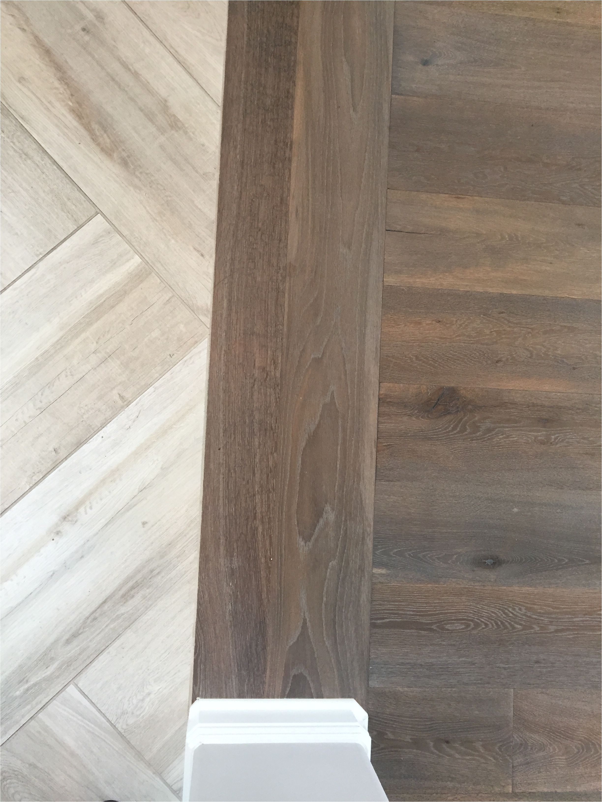 floor transition laminate to herringbone tile pattern