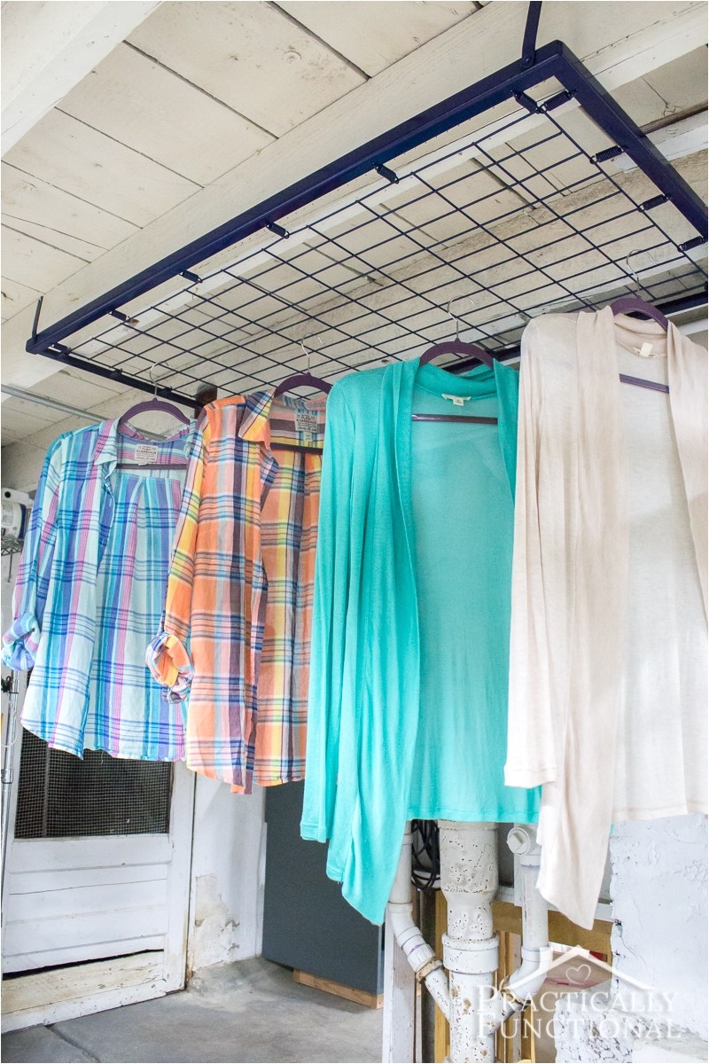 turn an old crib spring into drying rack for your laundry room