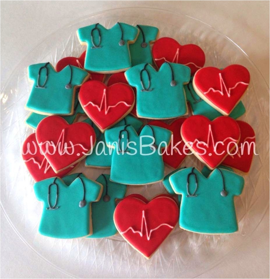 janis bakes medical scrubs and ekg heart cookies for a nurse retirement party