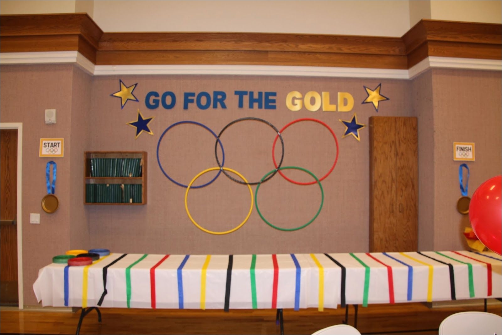 go for the gold olympic themed blue and gold banquet