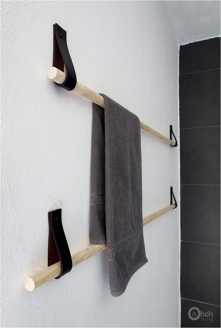 ohoh blog diy and crafts diy towel hanger a group of these hung one above another would make a great and inexpensive way to store large sheets of
