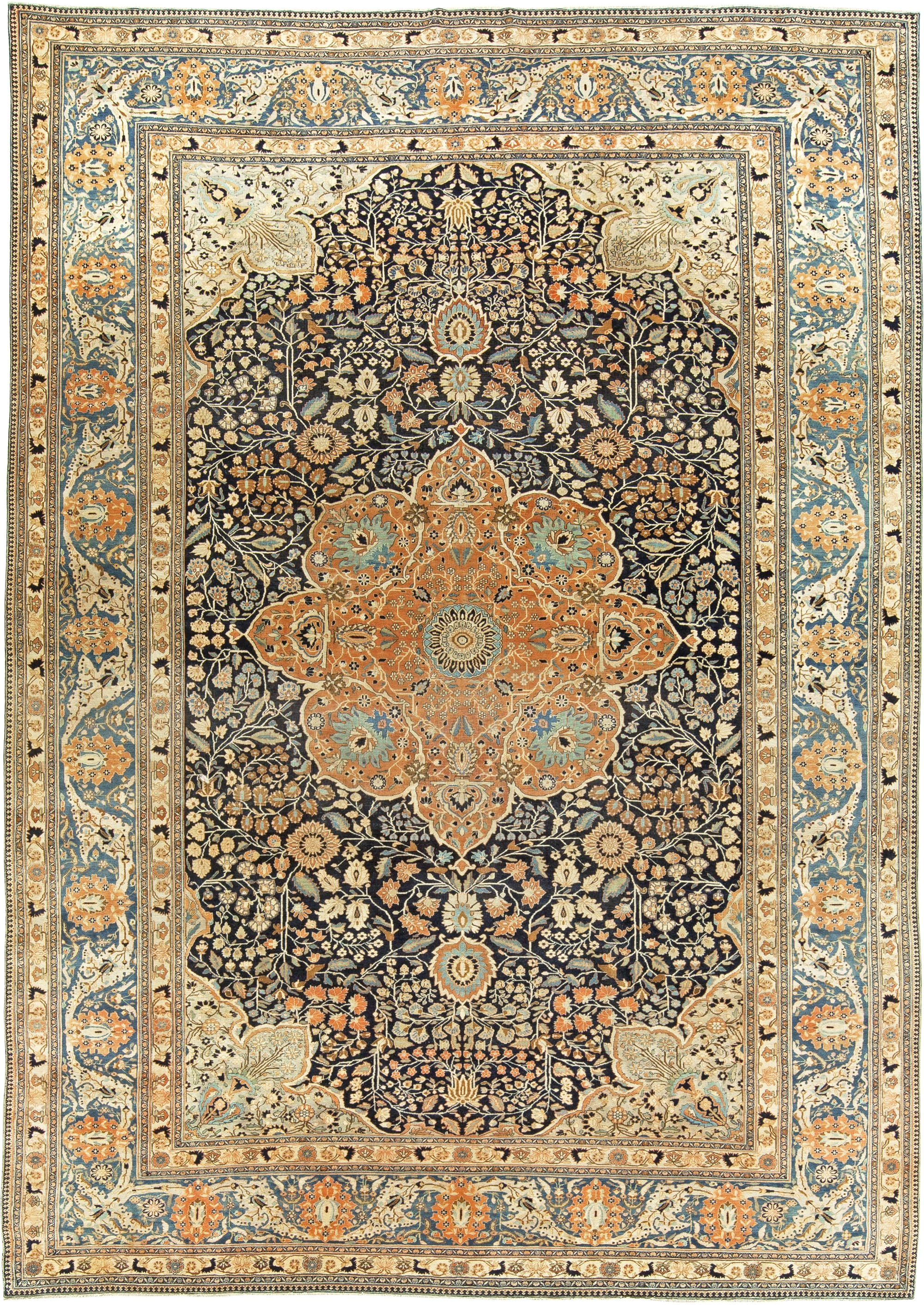 an early 20th century persian kashan carpet the blue field with an allover trellis of palmettes leafy vinery and central medallion within an unusual light
