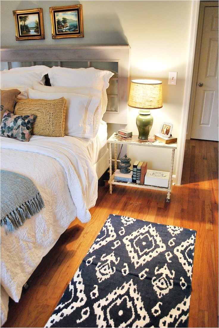 window headboard cute and functional side table and the ikat rug great sleeping
