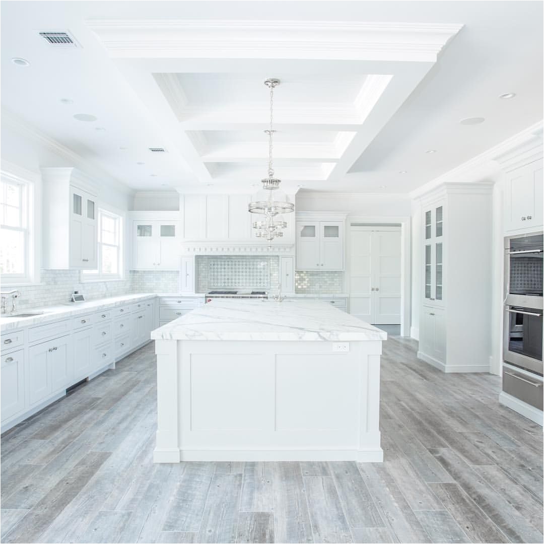 flooring grey porcelain tile with wooden look light grey grout at 15 degree offset place in all rooms and stairs excluding bathrooms