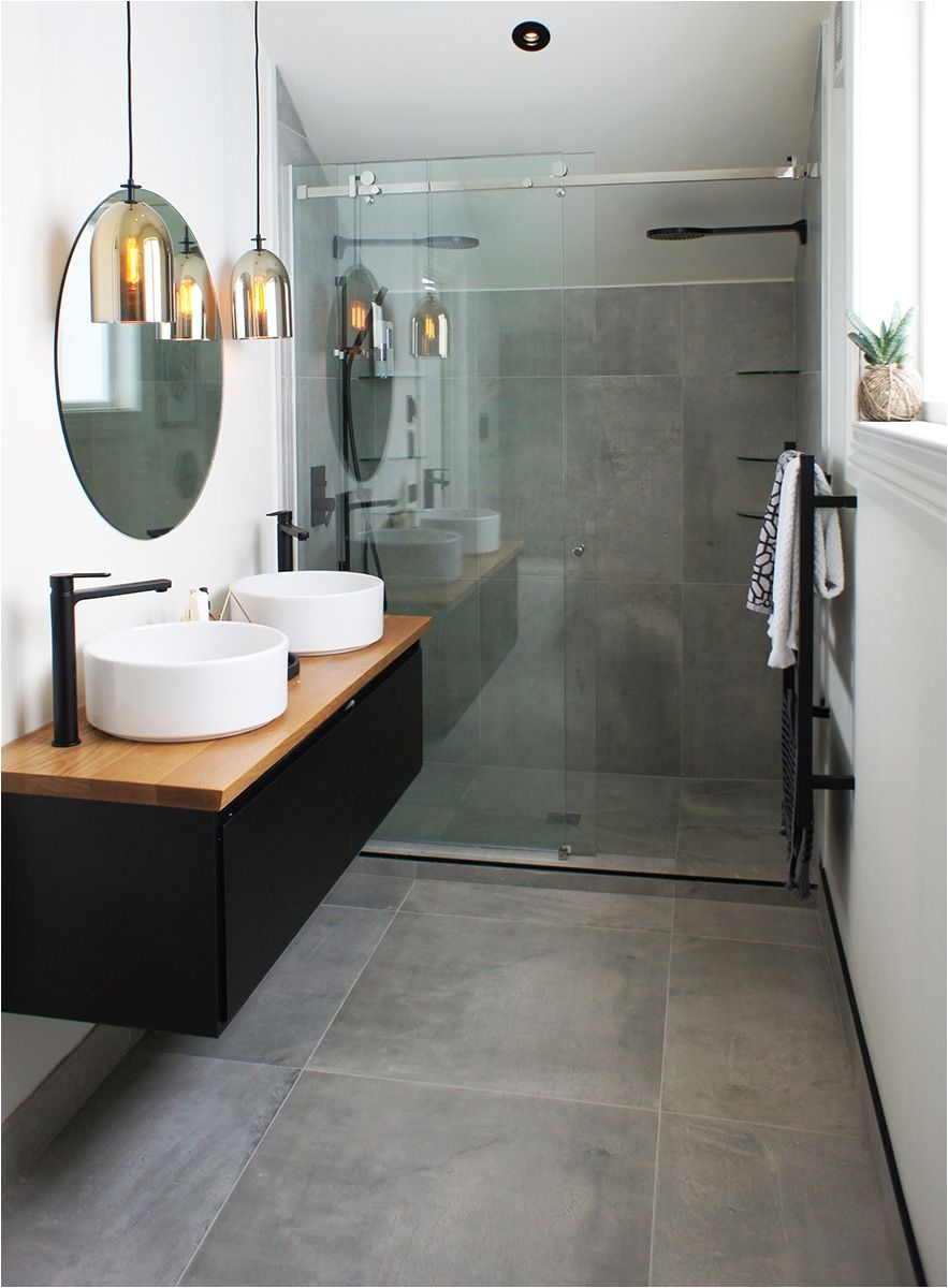 cat jeremy s ensuite uses the cementia grey 75 tile makes the space look larger than it really is