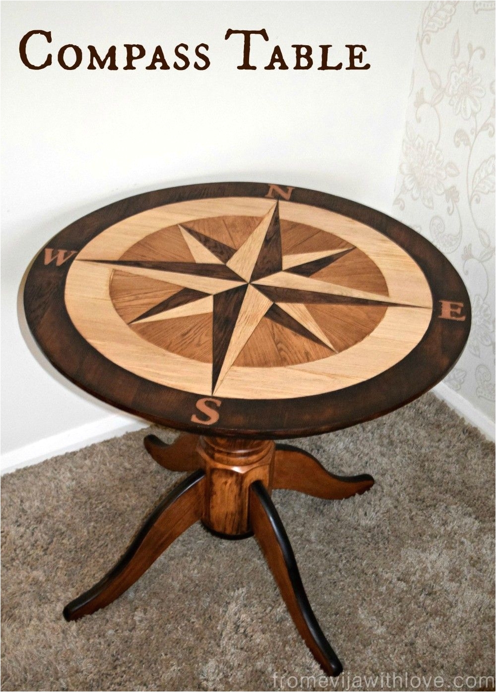 diy wood and stain compass rose table using floor planks cut out like a puzzle fabulous