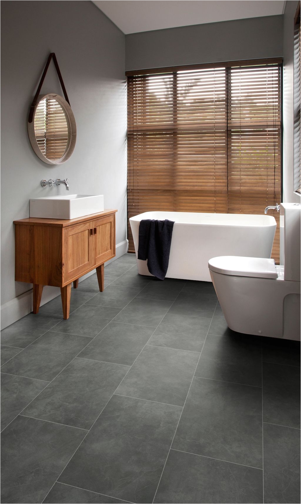 bathroom featuring secura pur luxury vinyl sheet flooring in plymouth slate
