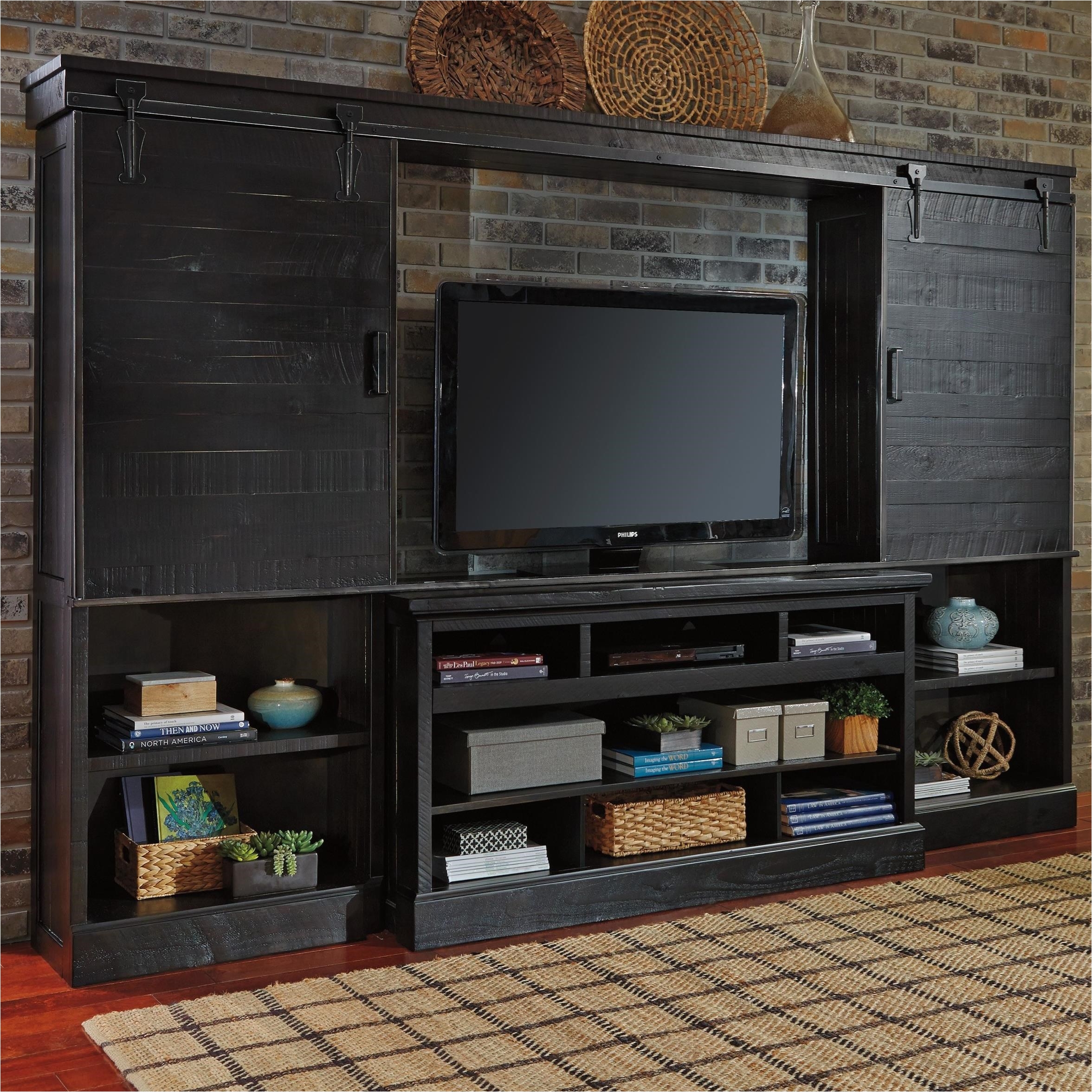signature design by ashley sharlowe large tv stand with bridge piers item number