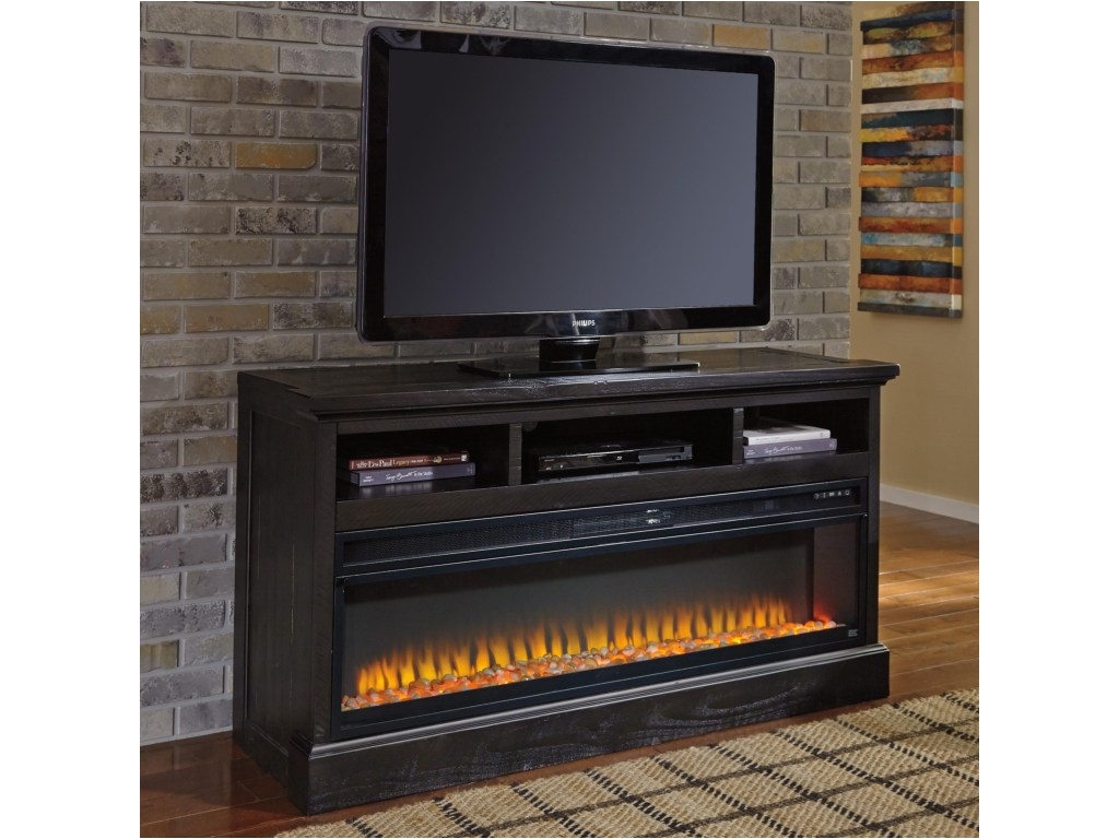 signature design by ashley sharlowelarge tv stand with wide fireplace insert