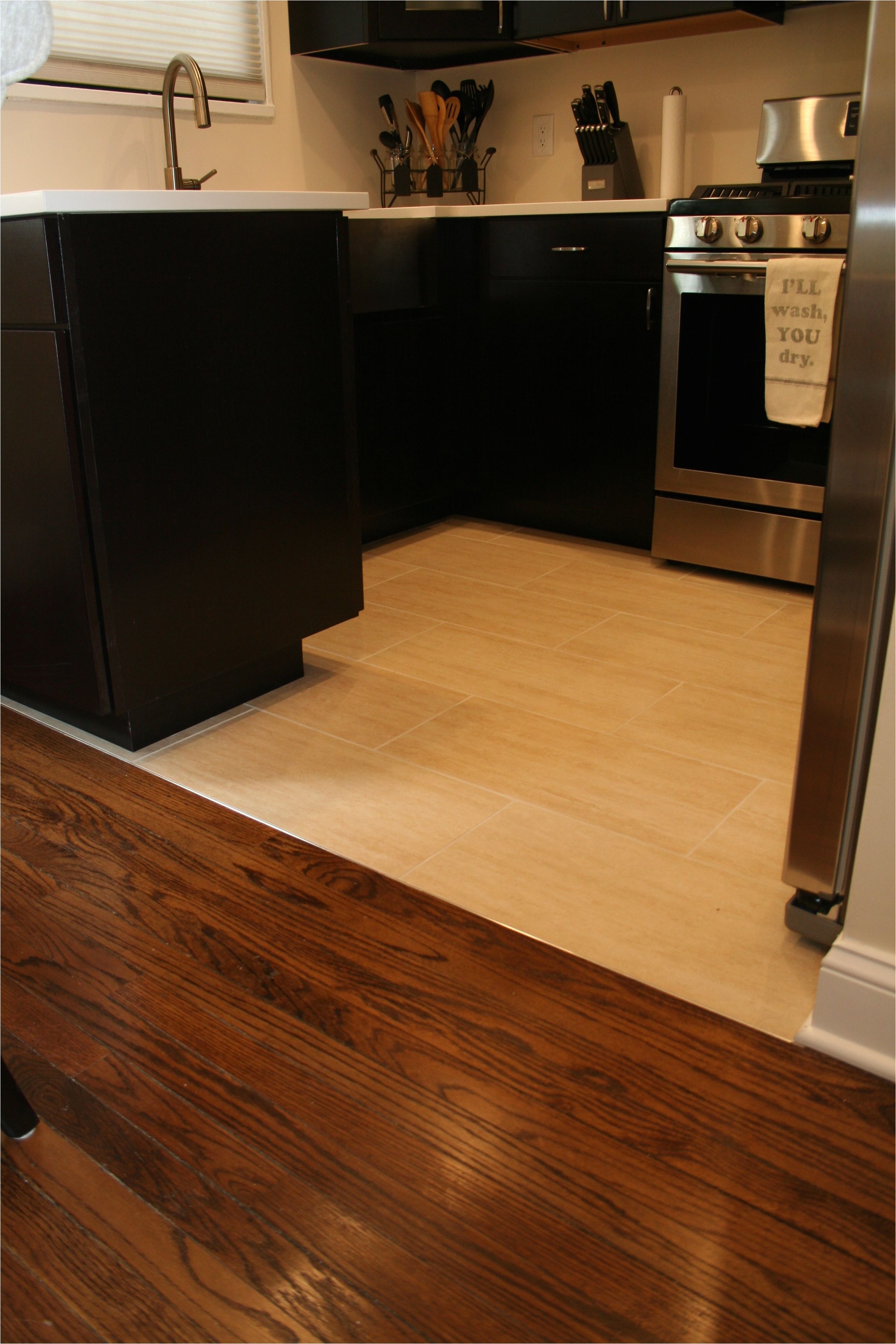 transition from tile to wood floors light to dark flooring http