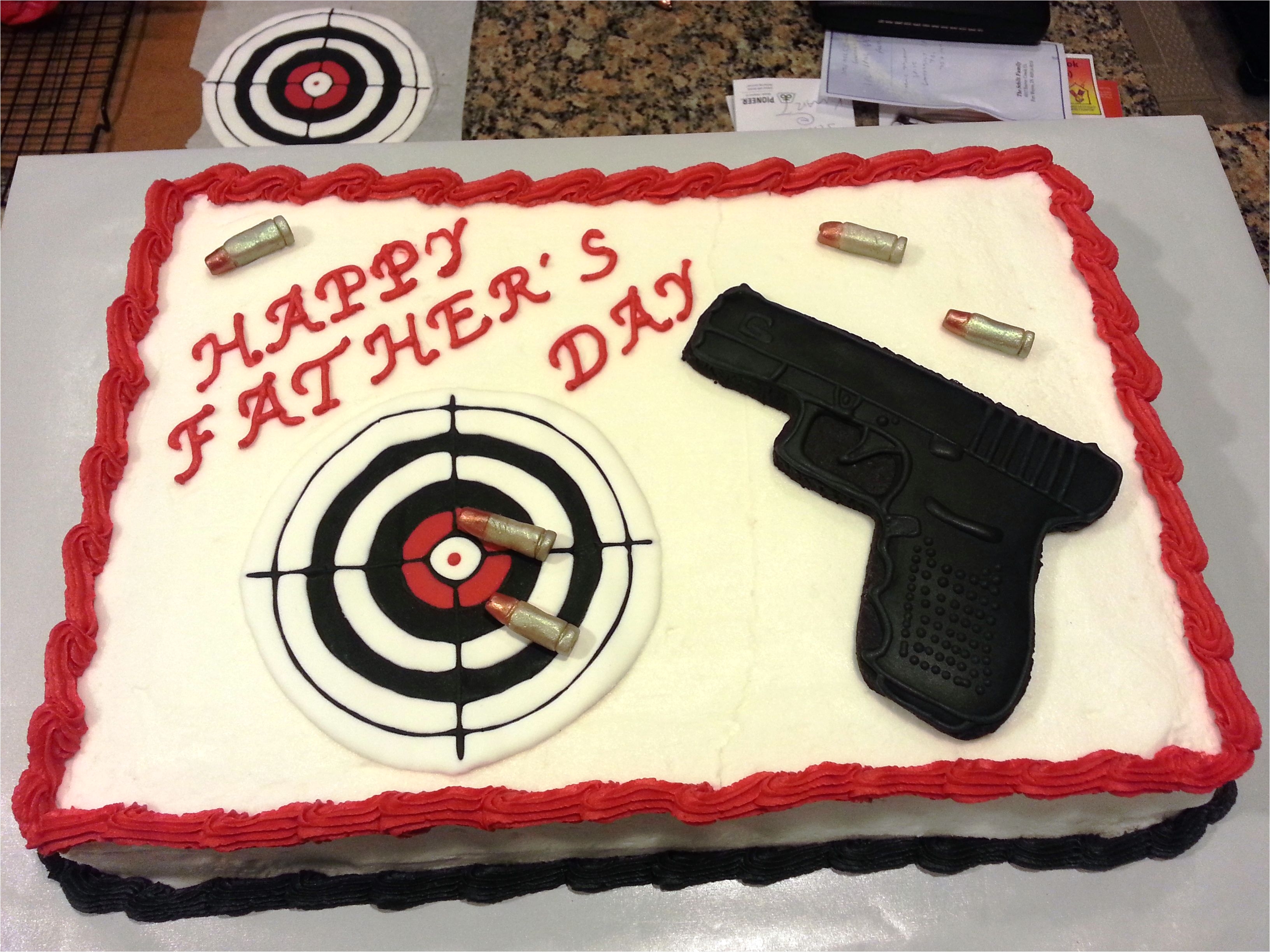 gun cake gun is a sugar cookie decorated with royal icing target hand made with royal icing bullets are modeling choc painted with dry luster dust