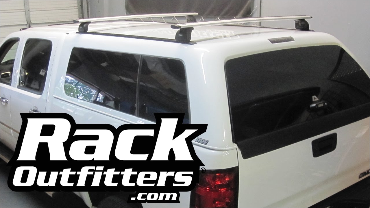thule rapid podium aeroblade roof rack on tracks for fiberglass truck cap by rack outfitters