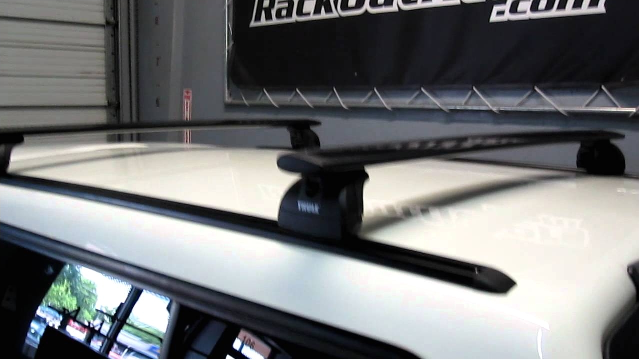 truck camper shell topper with thule 460r podium aeroblade base roof rack on tracks by rack outfitters