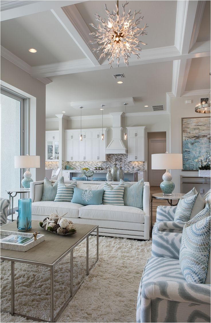 coastal style palette of blues aquas and natural browns accented by metallic silvers and grays