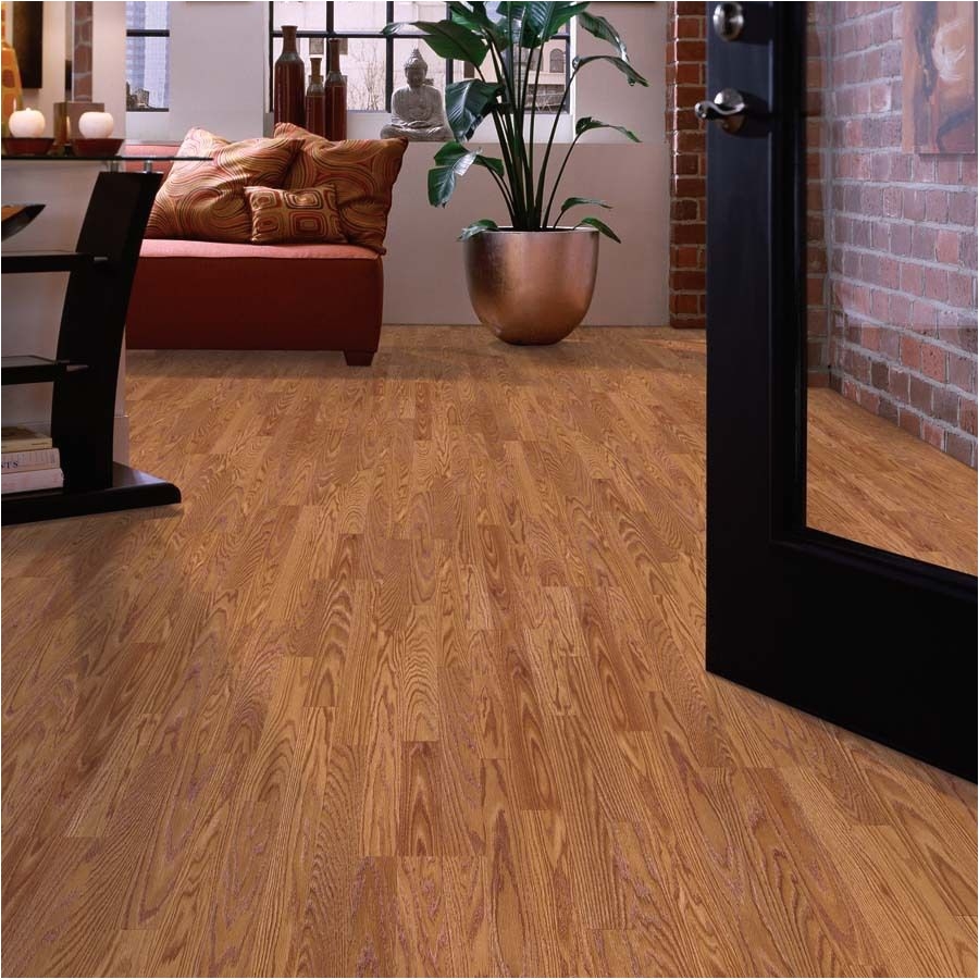 shop allen roth 7 5 in w x 47 25 in l gunstock oak laminate flooring at lowes com for basement guest room and sitting play area
