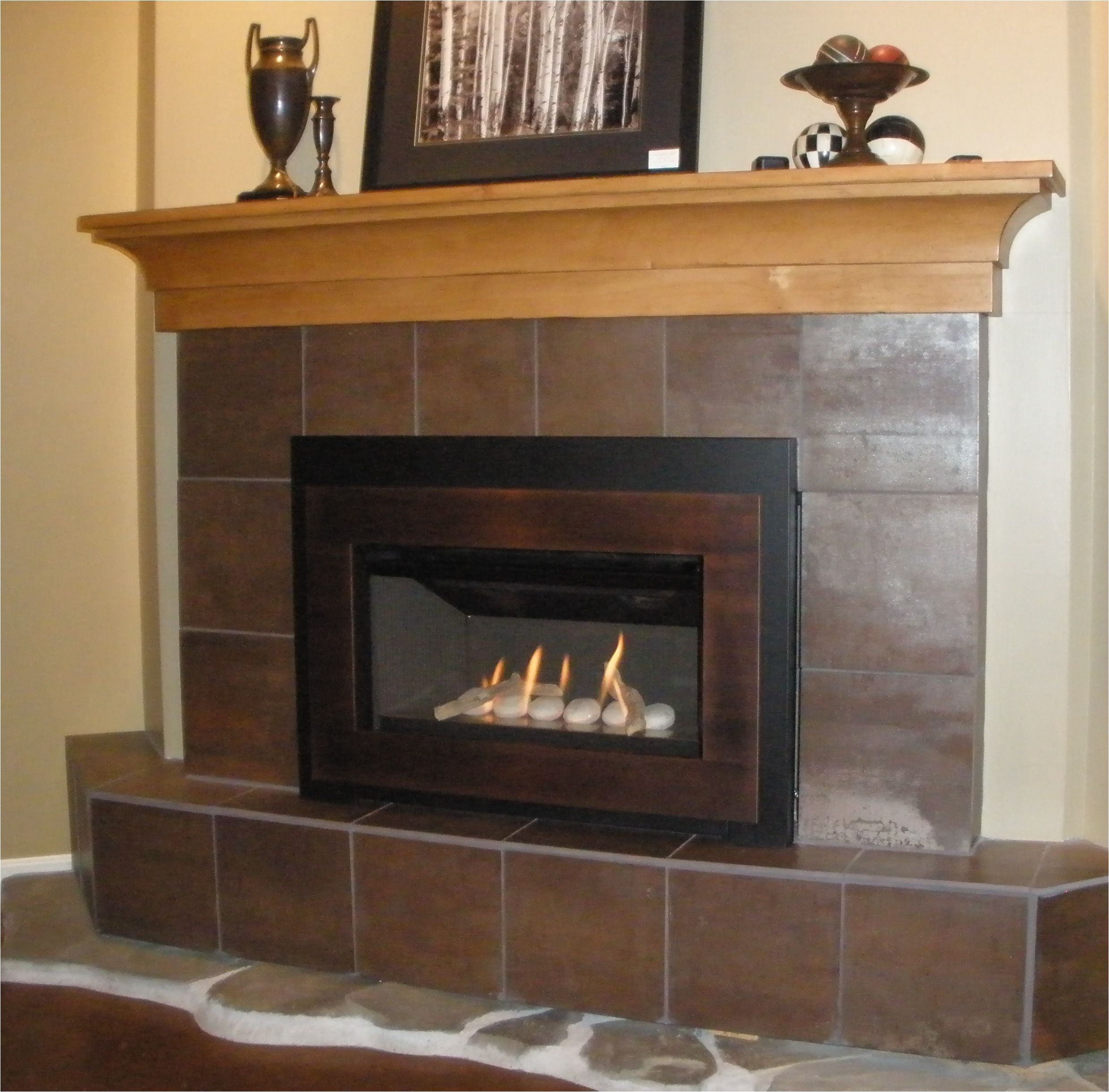 valor g3 739irn gas fireplace insert with creekside rock bed fire effect and brushed copper surround
