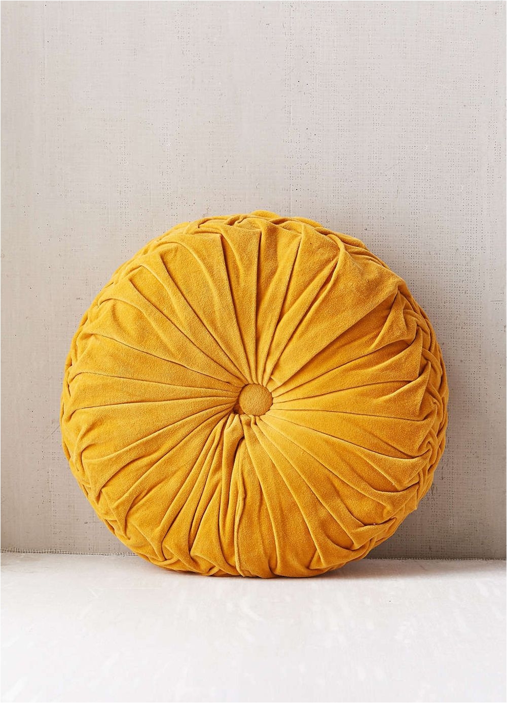 mustard yellow velvet cushion from athropologie interiors interior design comfort for the sofa