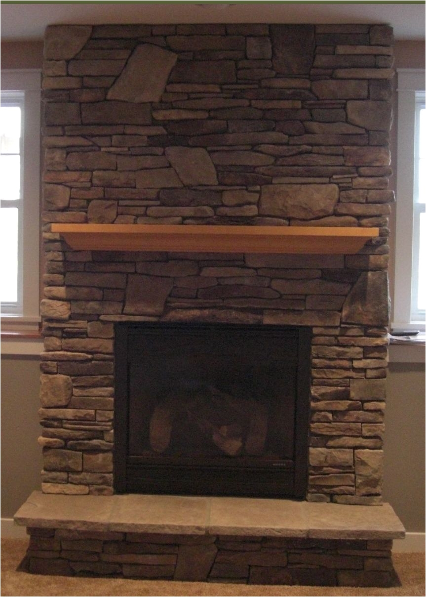 gas fireplace with cultured stone
