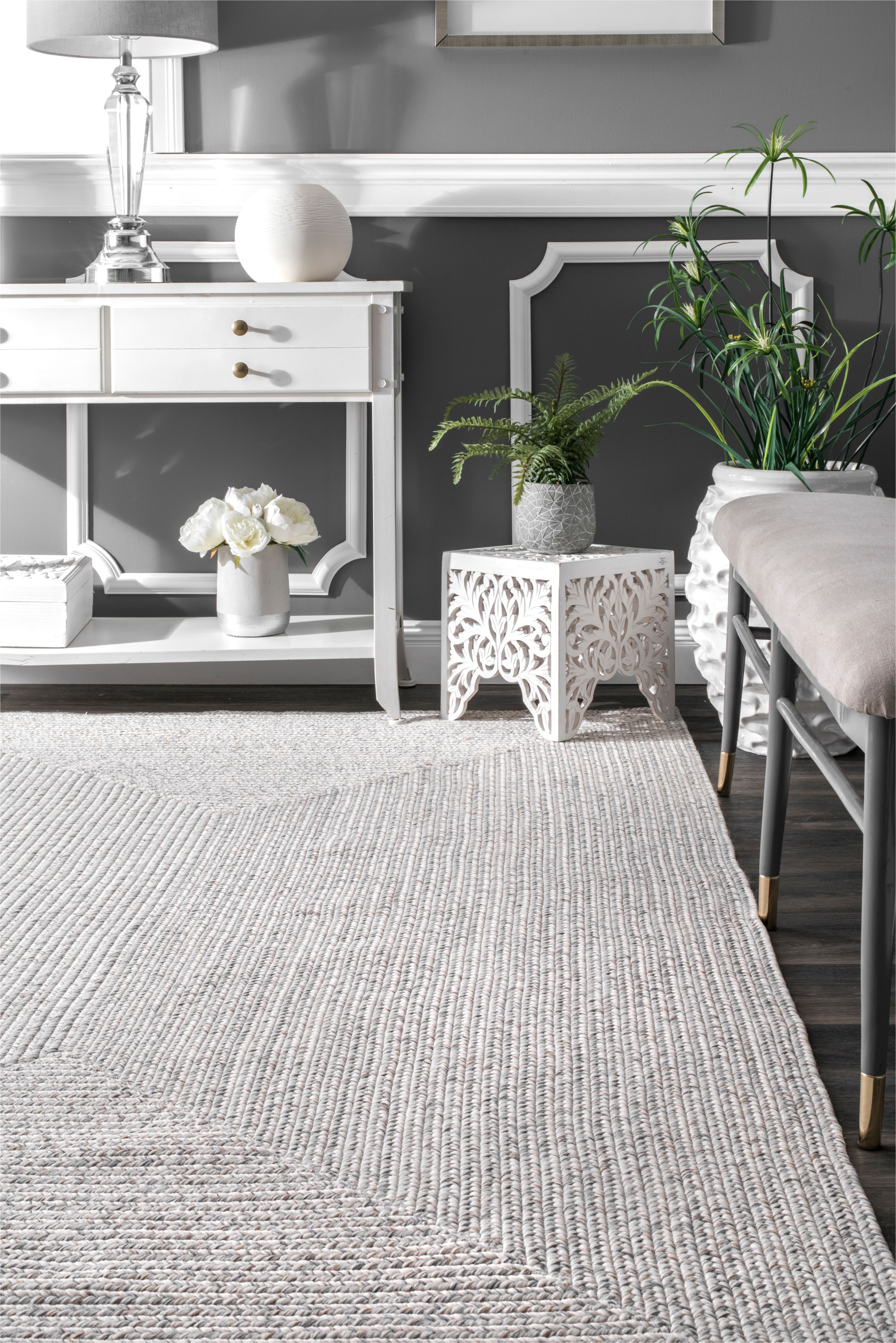 bring this contemporary and braided rug to give an elegant and chic look to your home made of 100 percent polypropylene fiber the rug is thin and easy to