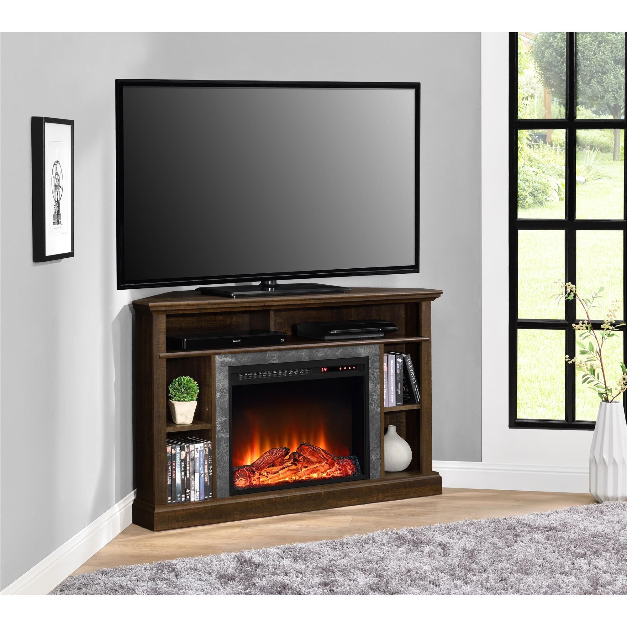 this contemporary styled warm espresso altra overland corner fireplace console includes a 23 inch fireplace insert with a remote to heat up to a 400 square