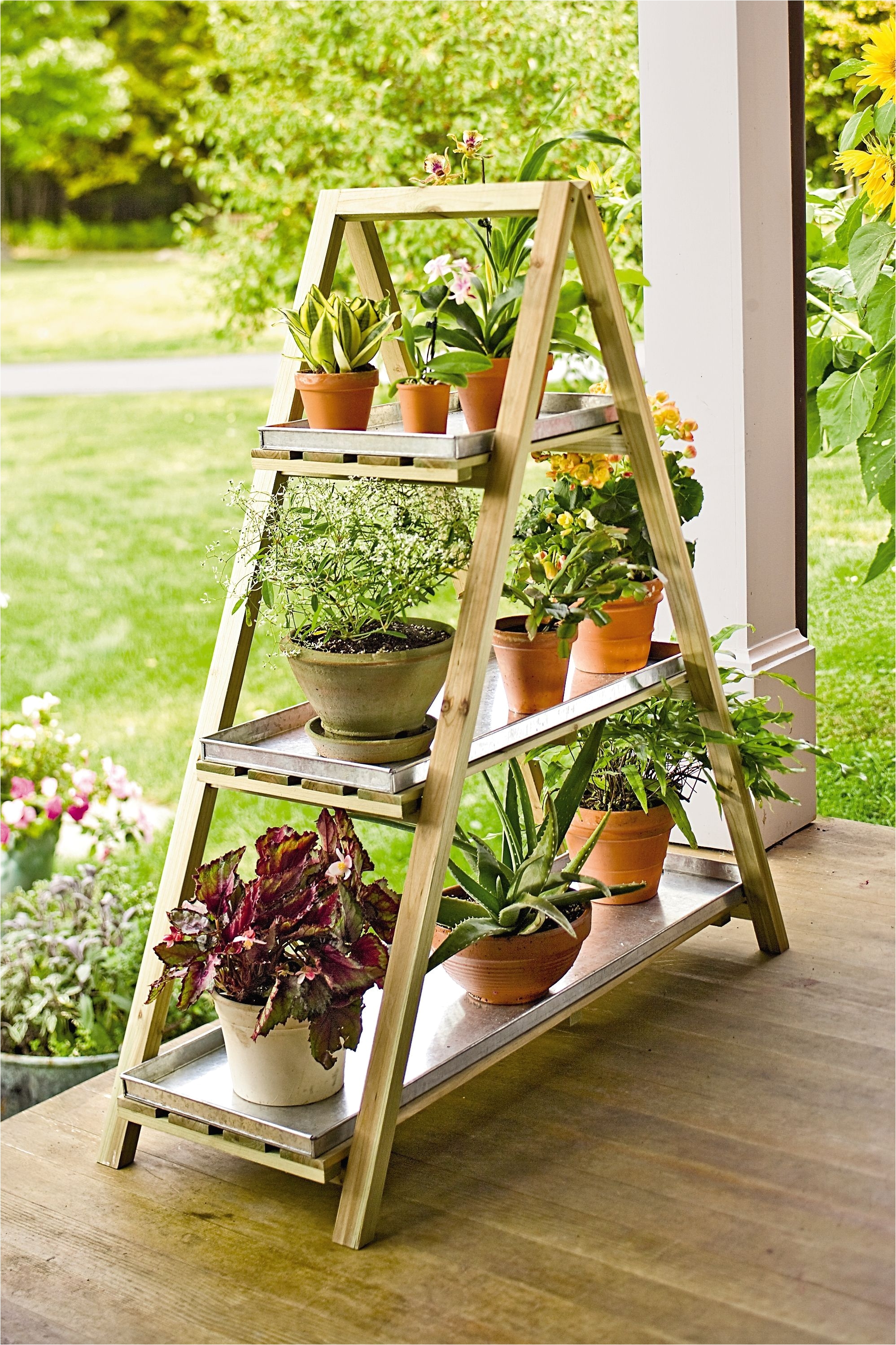 factory second a frame plant stand this looks like it would be pretty simple to build but if you aren t crafty with wood you can buy it