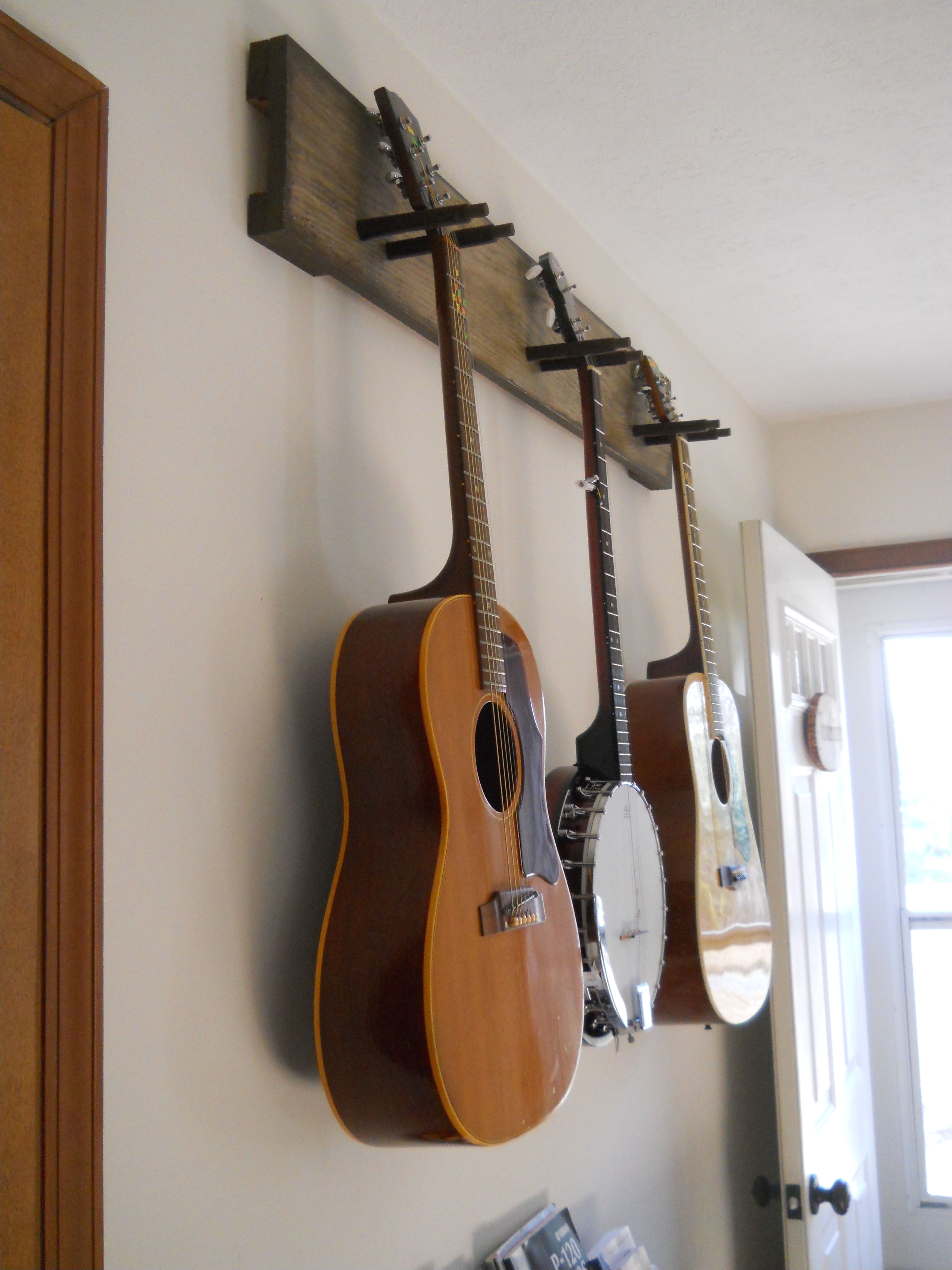 diy guitar hanger simple secure we practice so much more since we ve put this up