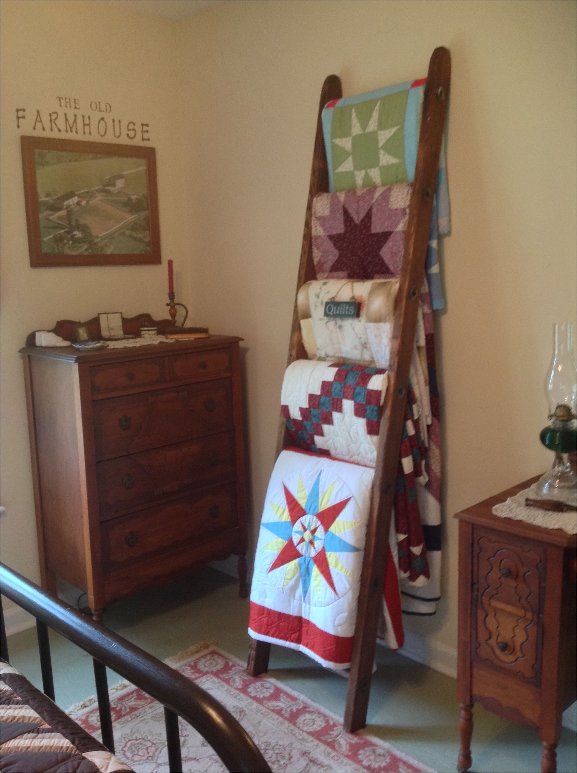 old ladder turned into a quilt rack