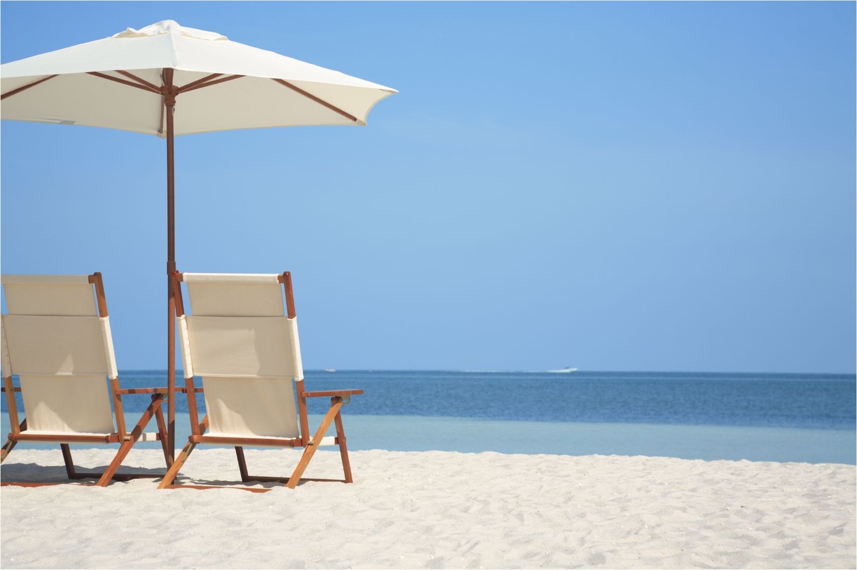 Sun Tanning Beach Chairs Beach Chair Beach Chairs and Umbrella On Tropical Beach Beach