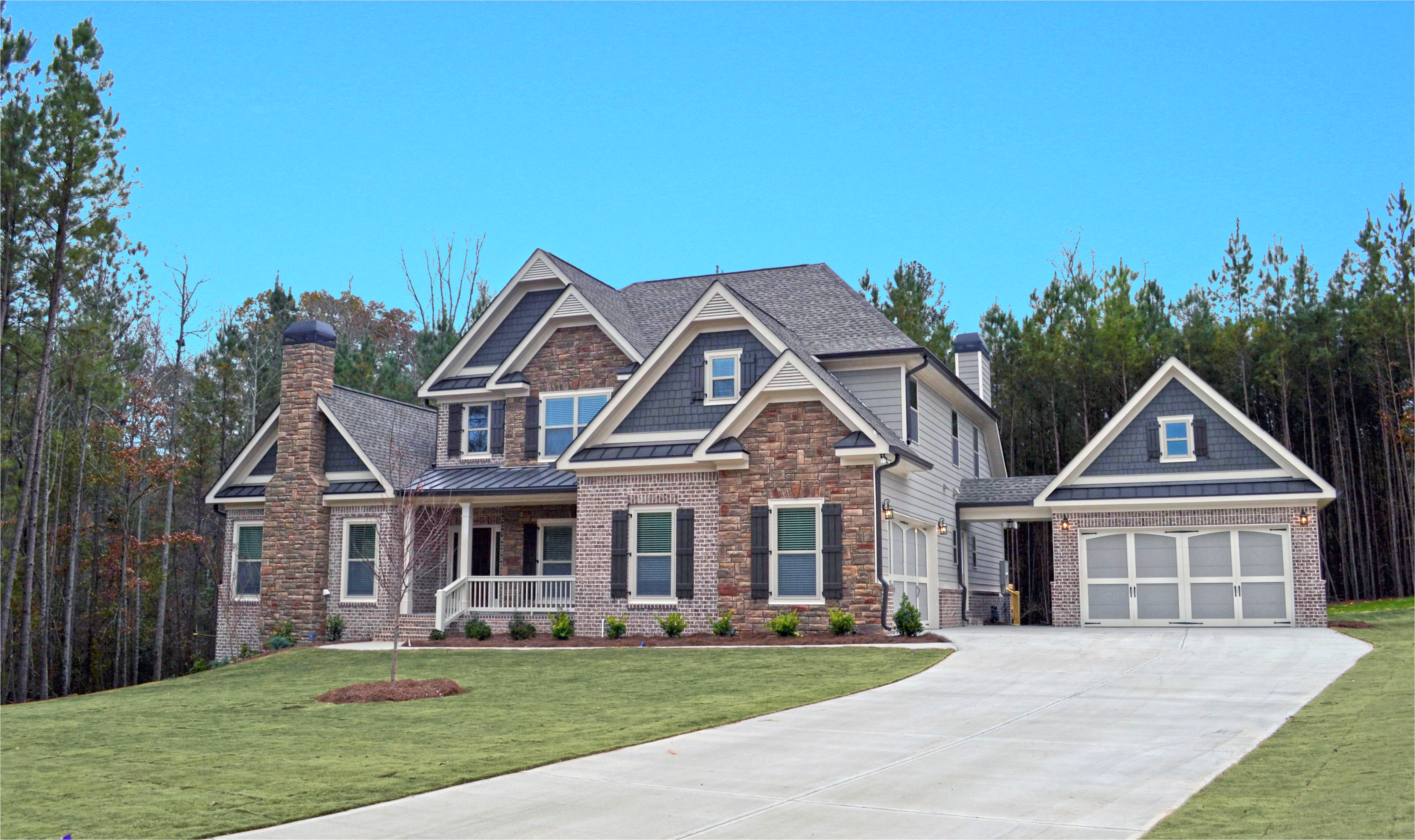 rock accents on the front elevation with durable hardie siding on the sides rear and beautiful brick water table on the sides welcome home to weston