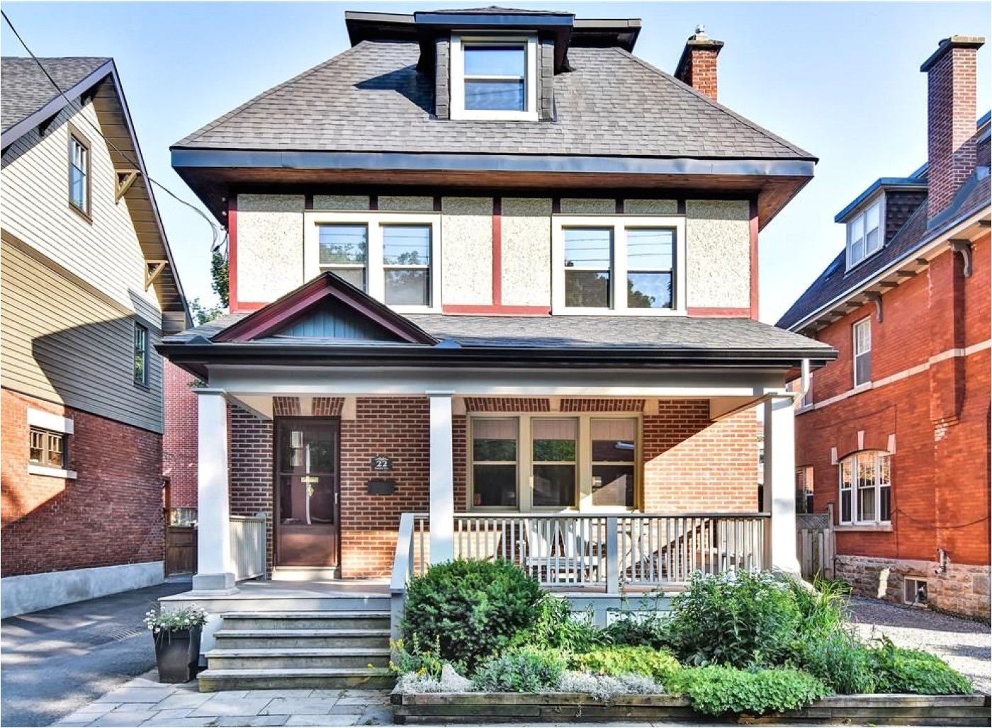spacious tudor style home with charming veranda on a popular street in old ottawa south main floor features kitchen with lots of storage granite counters