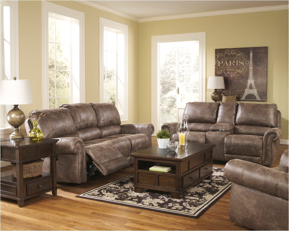 though ruggedly handsome the oberson reclining sofa is really a big softy offering the ultra cool look of battered leather without the cold leather feel