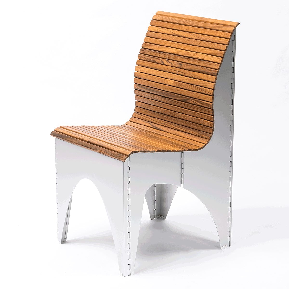 this folding chair is thoughtfully designed using tambour a flexible slatted surface fixed to canvas
