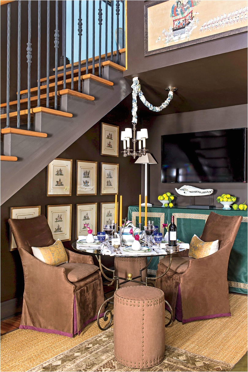 dining nook with glass table and brown chairs