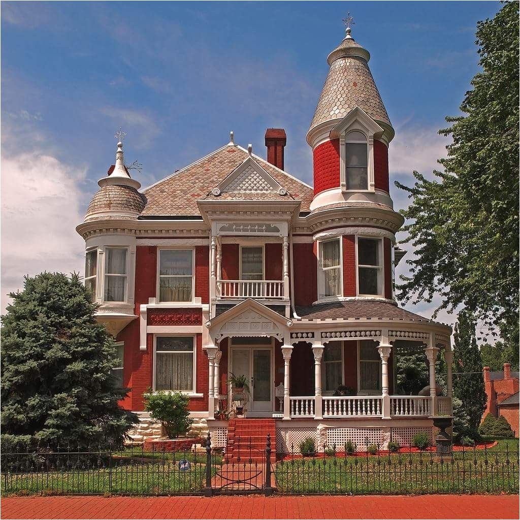victorian queen anne house balustrade fish scale shingles hip roof turret wrap around porch victorianarchitecture
