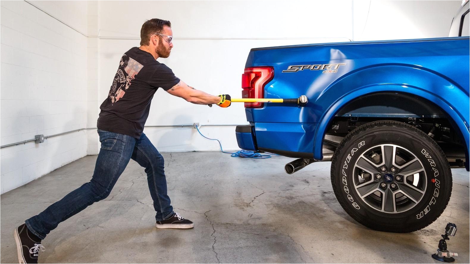 whats crazier than smashing an aluminum ford f 150 with a sledgehammer the repair bill