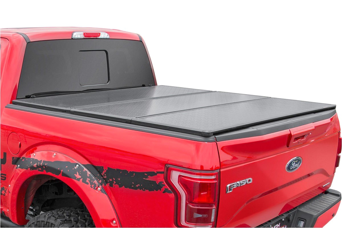 hard tri fold bed cover for 2009 2019 dodge ram 1500 pickups rough country suspension systemsa