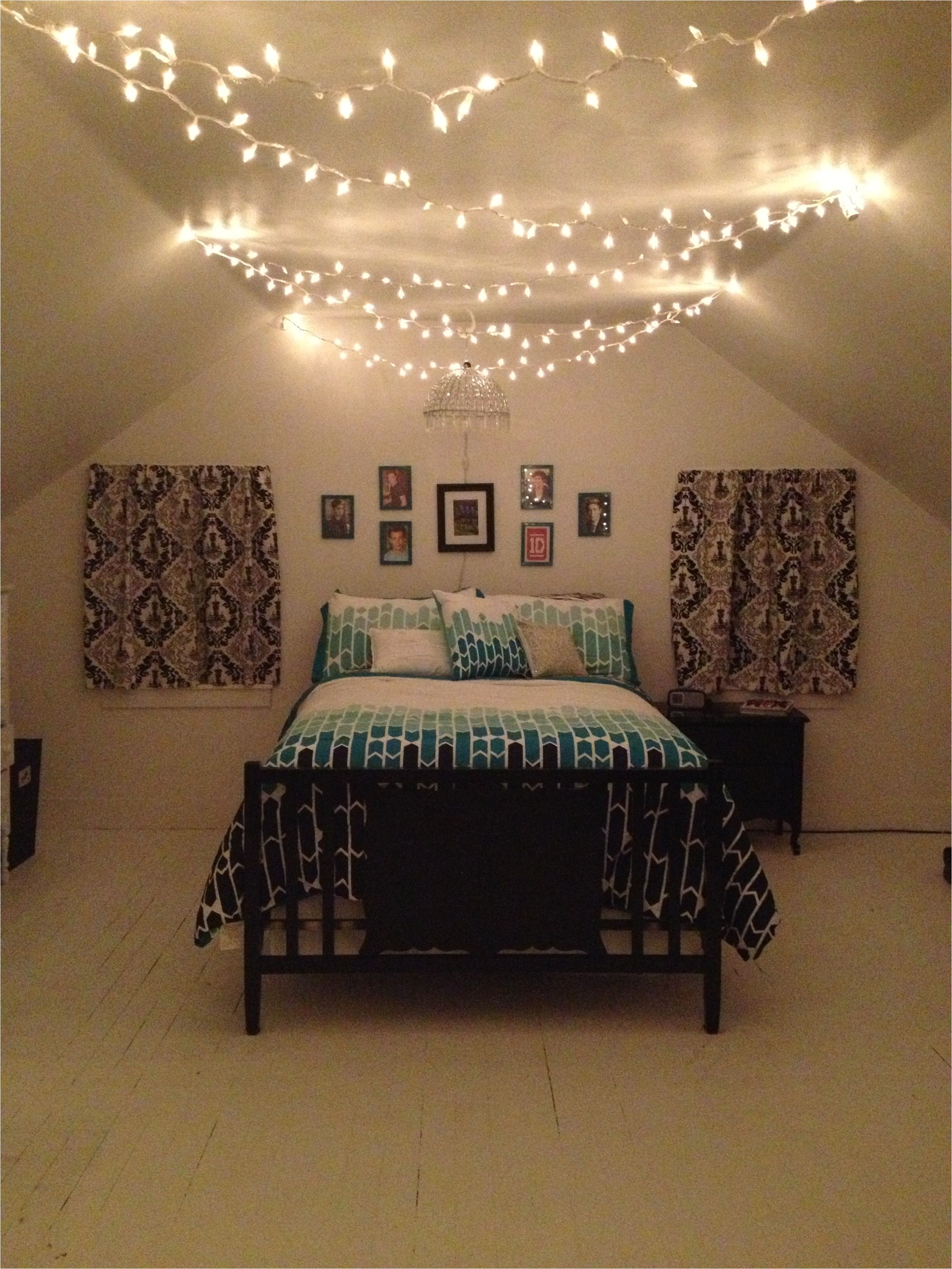 teenage bedroom black white and teal with christmas lights and one direction framed pictures for marley olivia