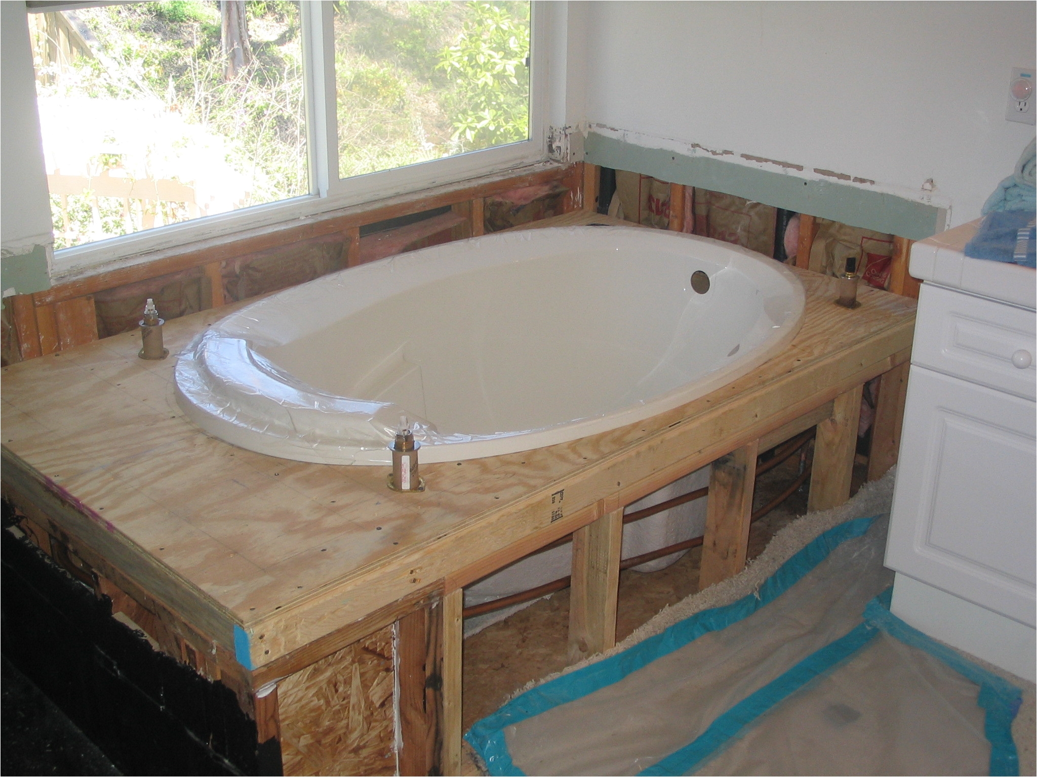 fitting a bath how to install a new bathtub