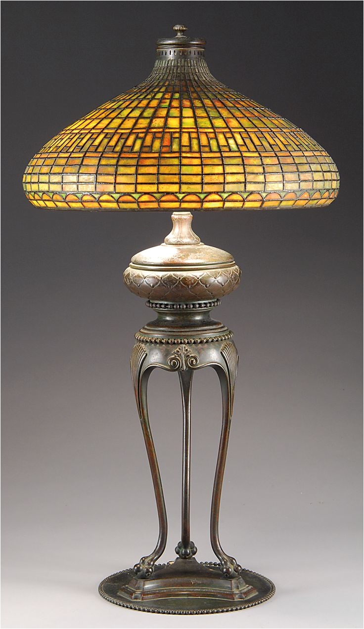 a tiffany studios chinese tyler table lamp consisting of a geometric pattern over a half moon