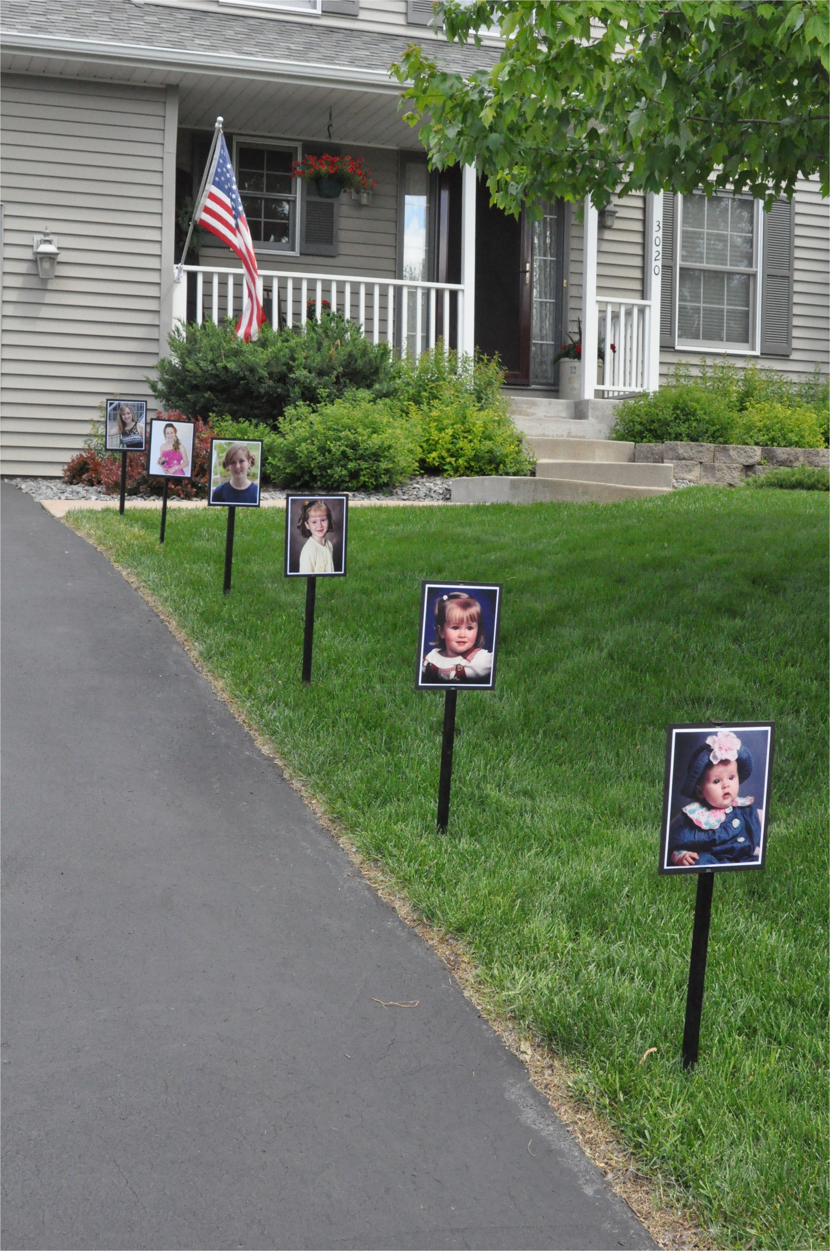 graduation party line the drive with pictures to watch the graduate grow up right before your eyes love this idea this was fun also