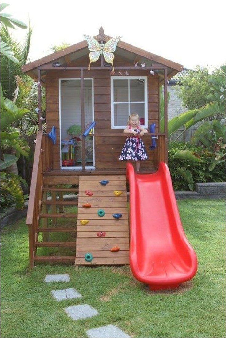 wooden playhouse playhouse with climbing wall playhouse with slide playhouse with deck playground ideas backyard