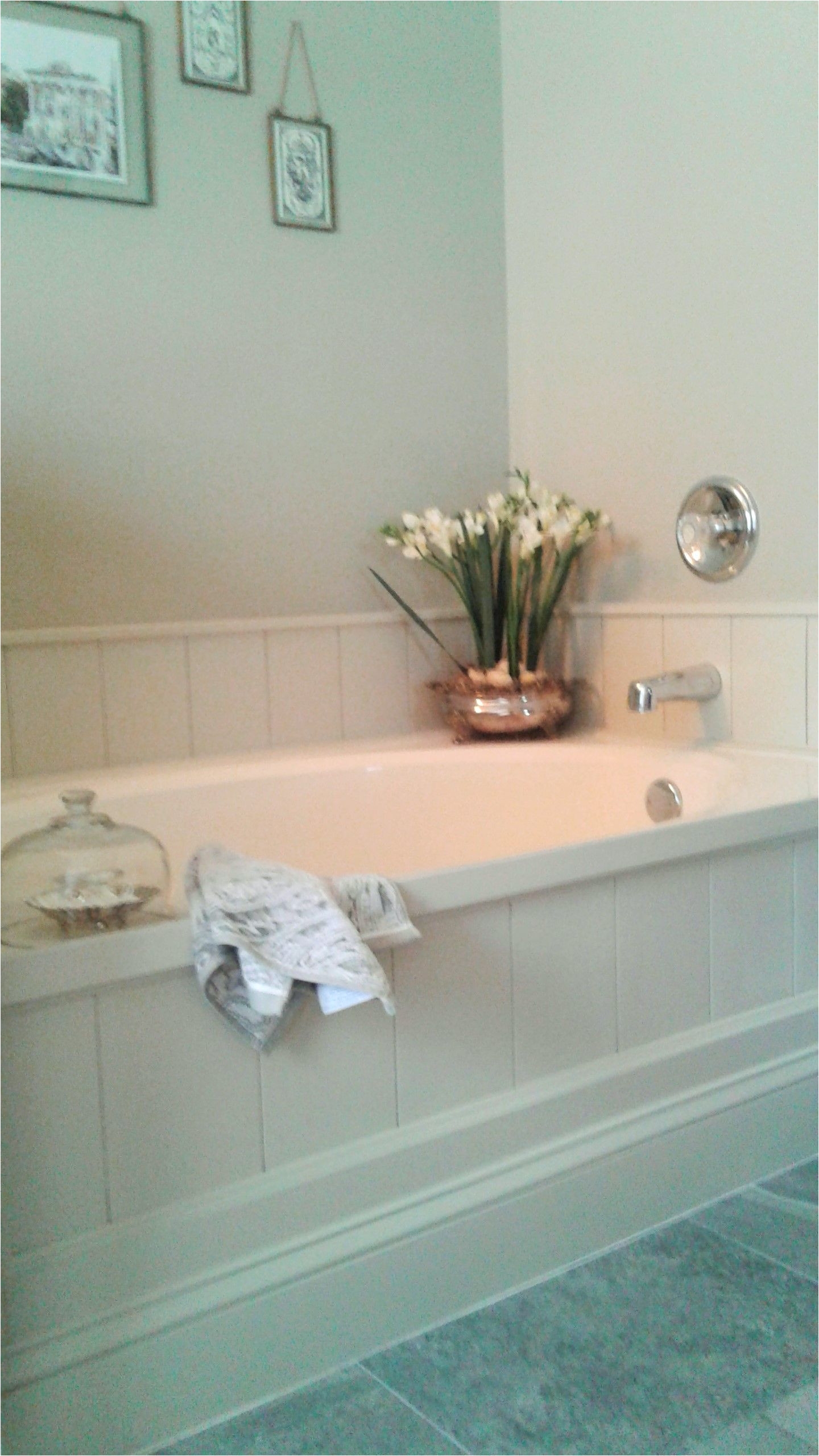 diy tub surround using peel and stick vinyl planks to create shiplap look