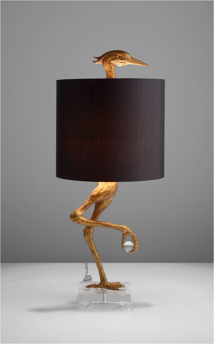 what a fun unexpected lamp ibis table lamp by cyan design would love to make one with gold chicken feet