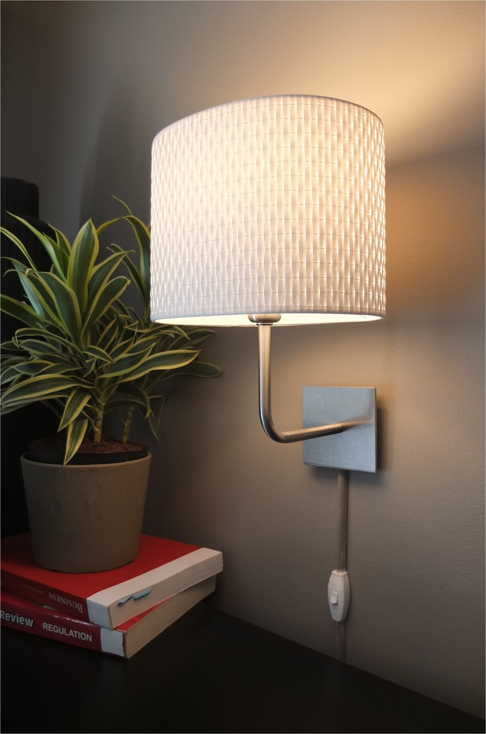 wall mounted ikea lamps are an easy way to add light in a room without a