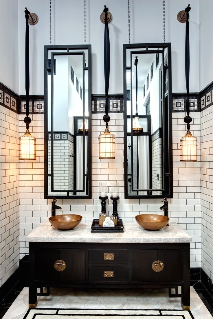 photos if incredible hotel bathrooms black and white industrial with white subway tiles double vanity sink with brass accents wire pendant light