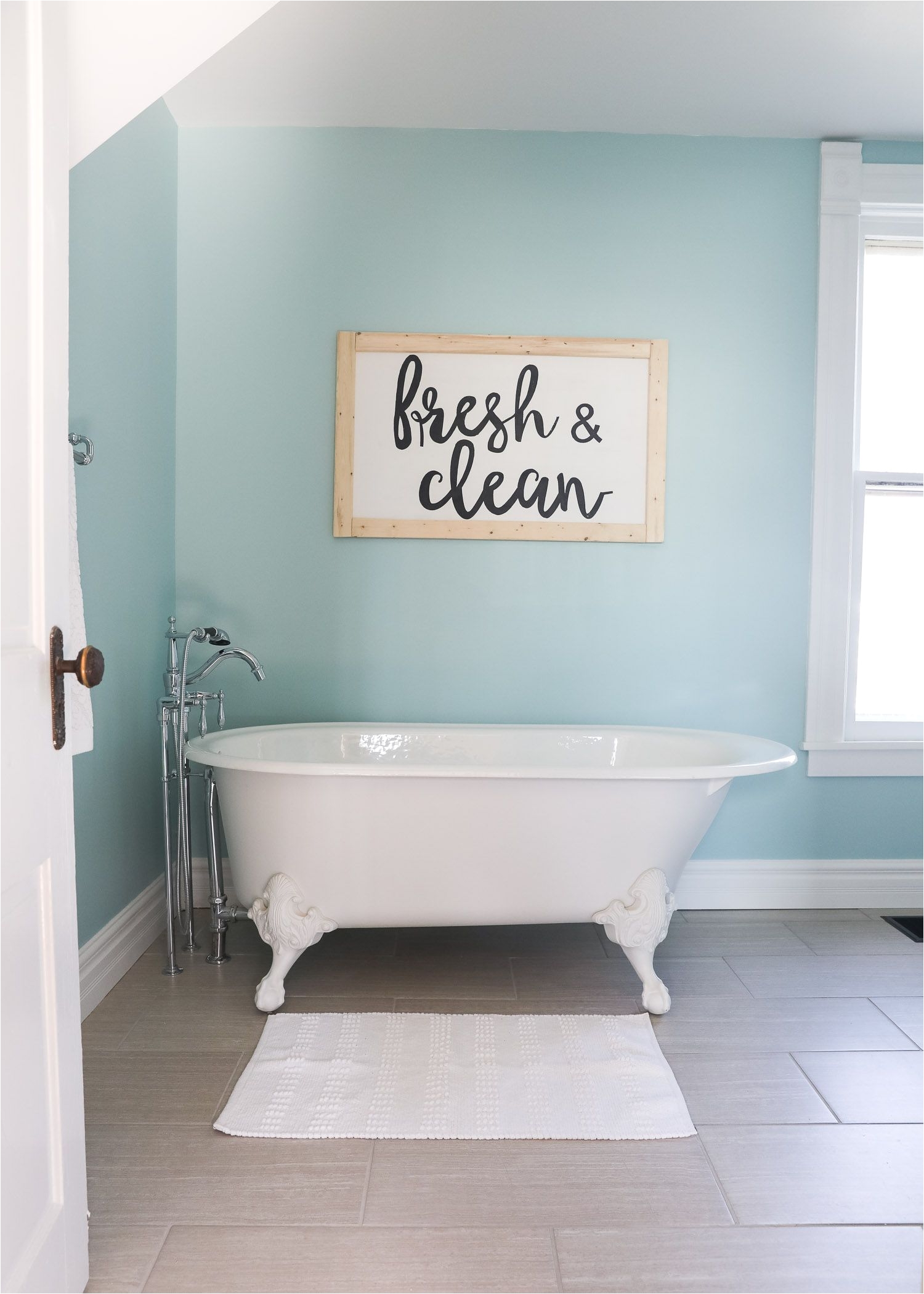 fixer upper bathroom before and afters fixer upper style bathroom makeover with clawfoot tub watery paint color and sliding bar door