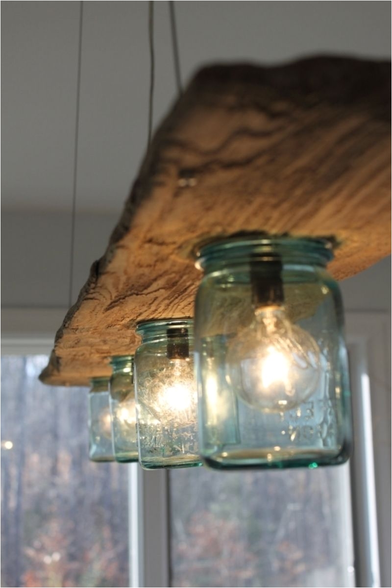 Driftwood Light Fixture 34 Driftwood Crafts to Give A Beachy Feel to Your Home Arts